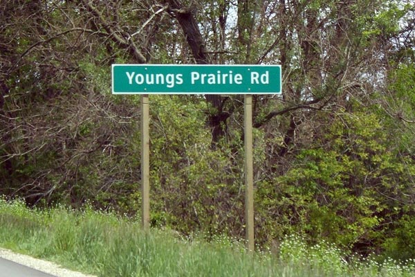 Youngs Prairie Rd sign on M-60