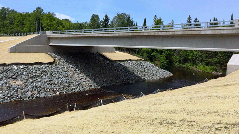 The replacement span on M-94 over the East Branch of the Chocolay River at the location of the washed-out culverts in Marquette County, opened to traffic June 28, 2017.