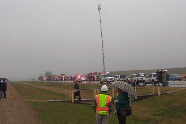 A procession of construction, maintenance and emergency vehicles assembled in the eastbound lanes beyond the parked cars of the attendees. Maintenance vehicles from MDOT and the Kent County Road Commission as well as emergency vehicles from all cities and townships along the route were present.
